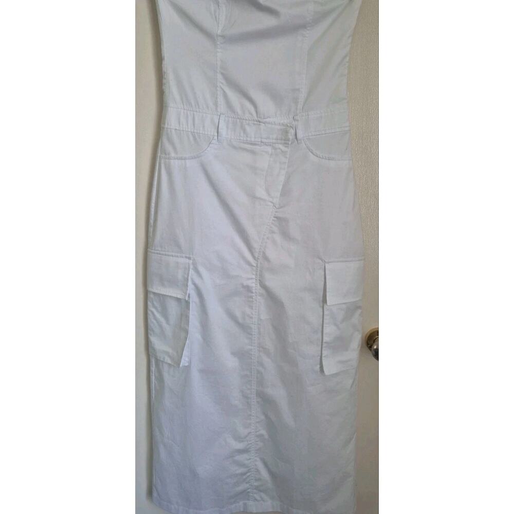 This is a Zara white strapless cotton cargo-style summer dress.